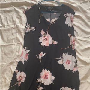 Asymmetrical black dress with flowers